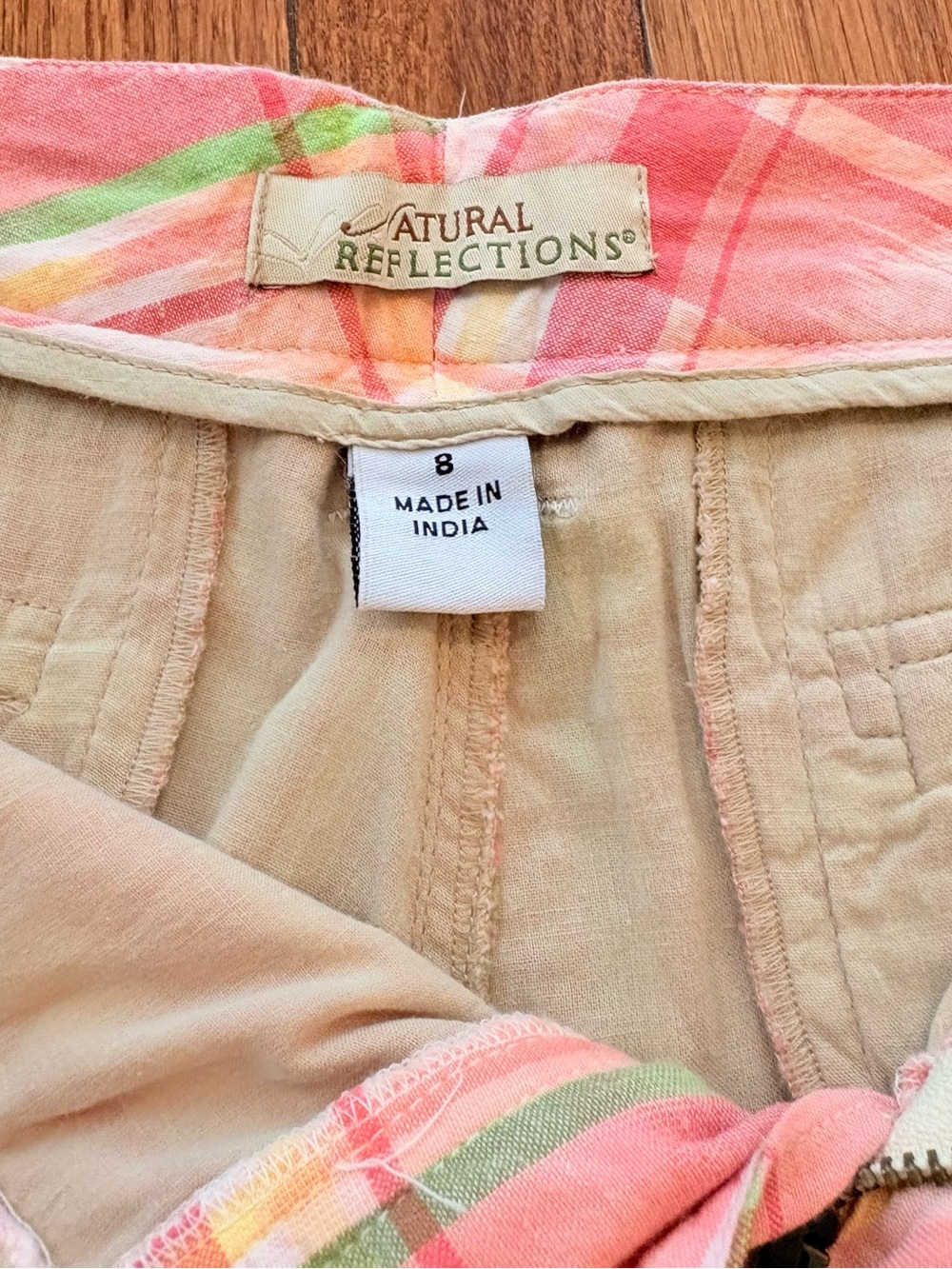 Vintage women’s Natural Reflections shorts with a coral, green & yellow pattern